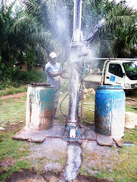 Drilling water well in village