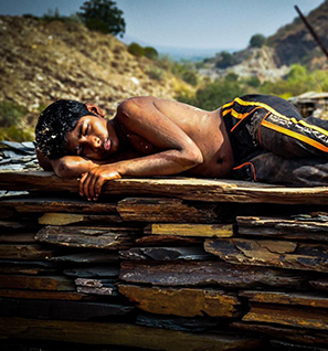 Indian child sleeping in quarry