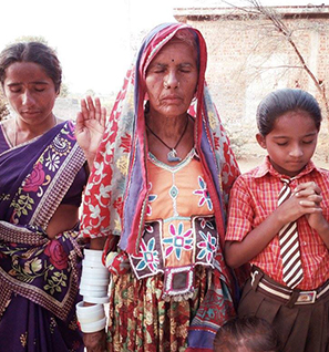 Indian people praying