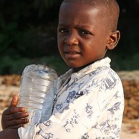 Child holding a water bottle